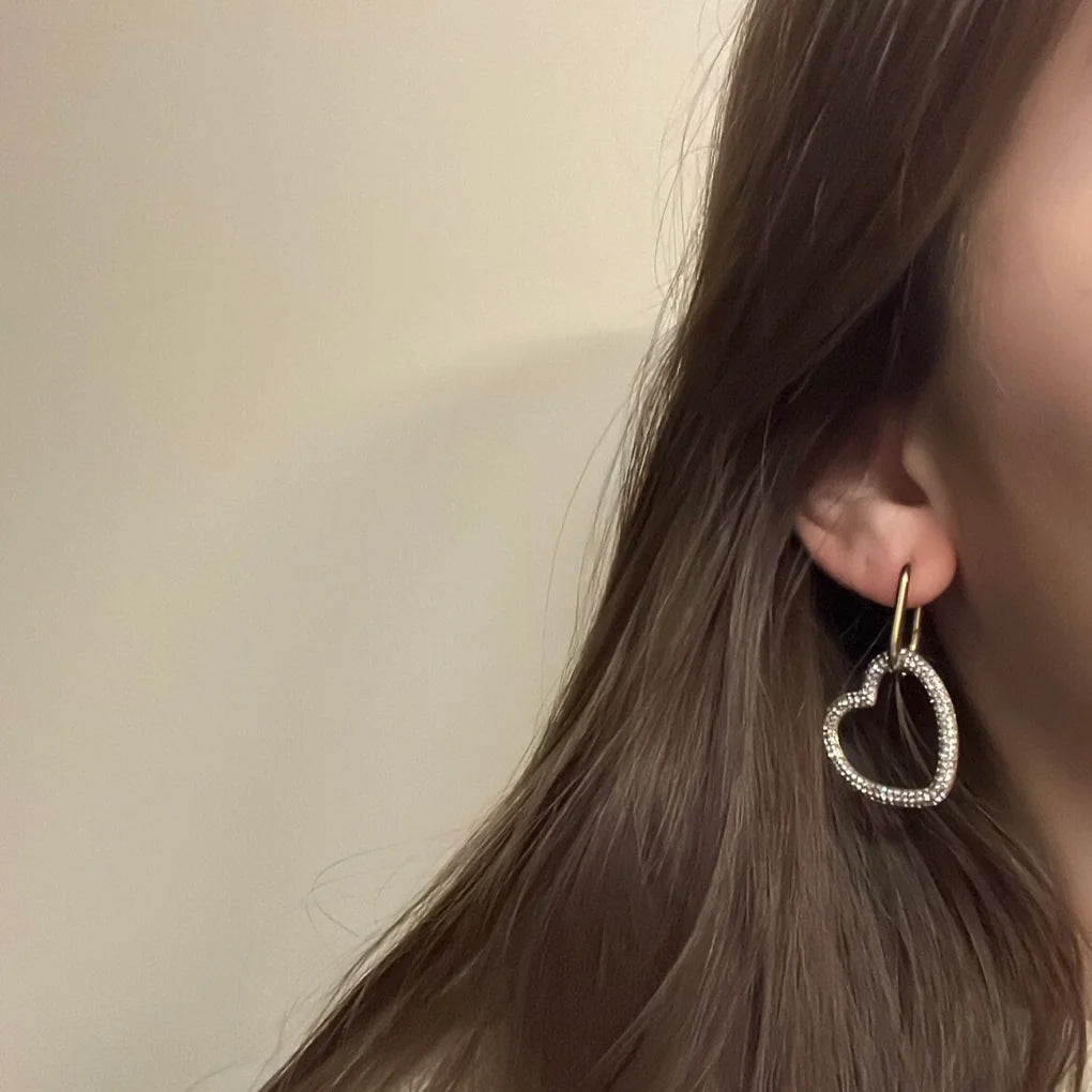 Shimmer heart oorbellen goud